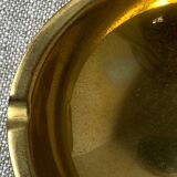 Brass ashtray in the shape of a boat shackle