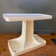 Thermoformed plastic table