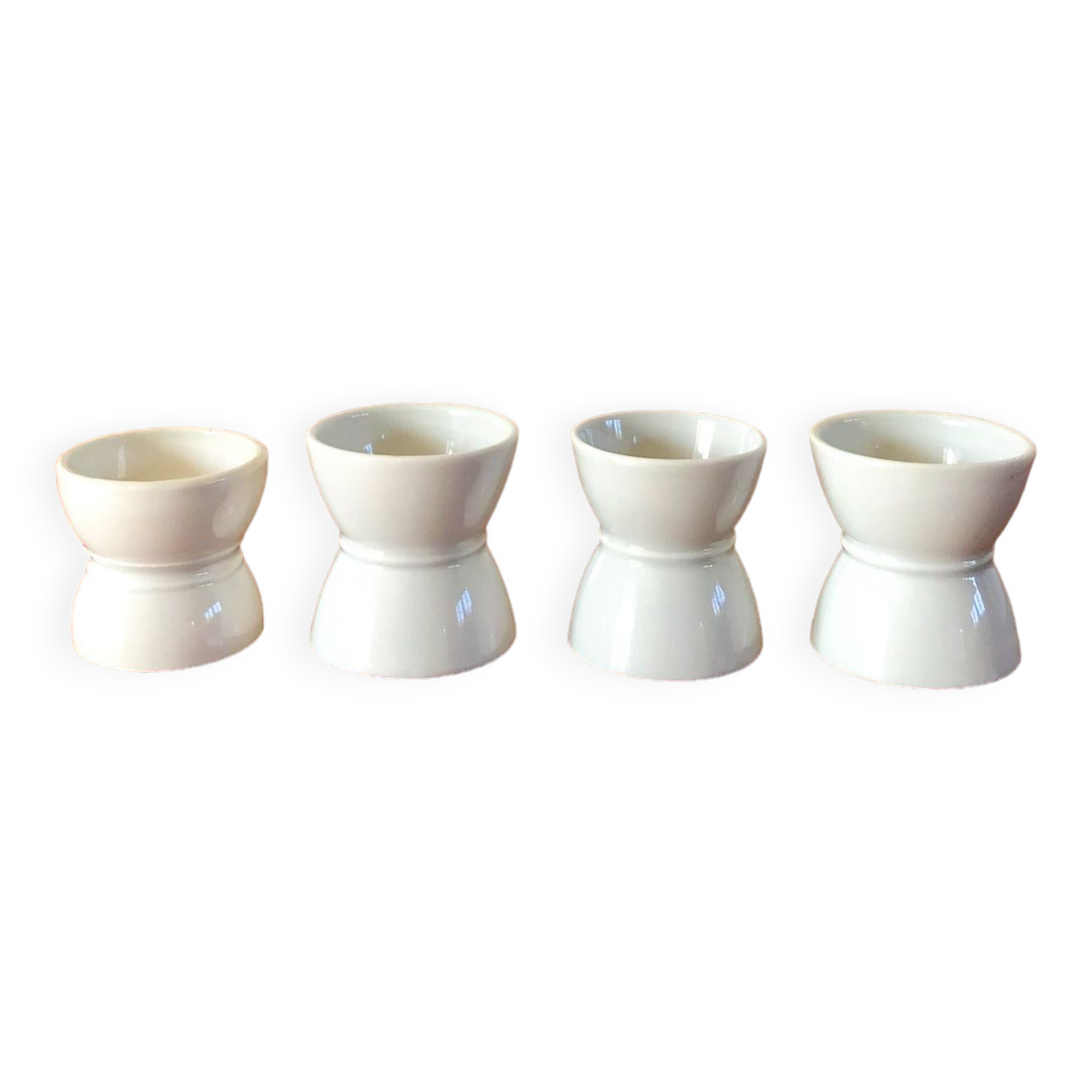 set of 4 earthenware diabolo egg cups early 20th century
