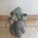 Anthropomorphic pitcher Dog