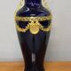 Vase signed Legastelois in blue ceramic of Sèvres and gilded bronze