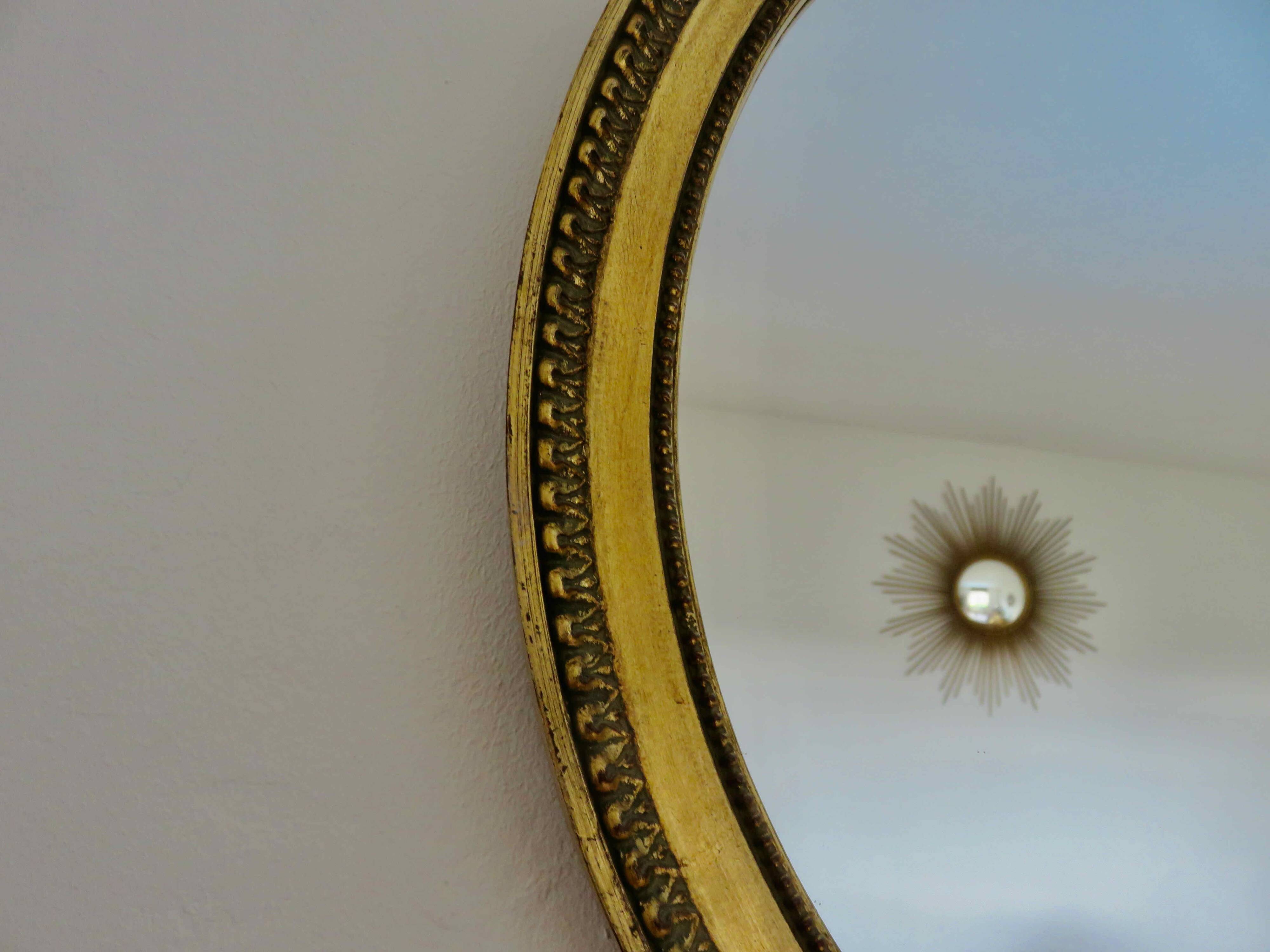 Louis Philippe oval gold wall mirror, 1950s