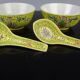 Pair of porcelain bowls and spoons "Famille Rose" China, early 20th century.