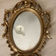 Petit miroir ovale signé Tallandier en laiton doré style Rococo – 30x2