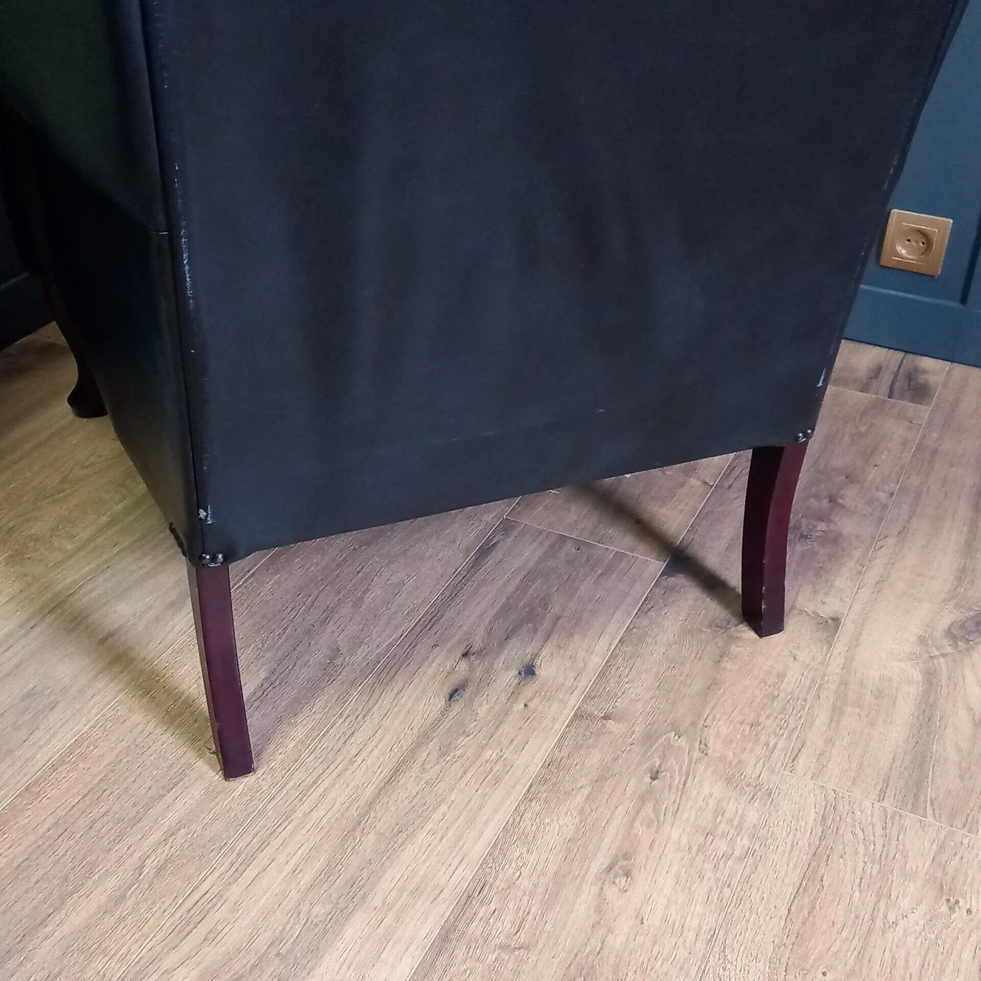 Blue chesterfield barrel back armchair
