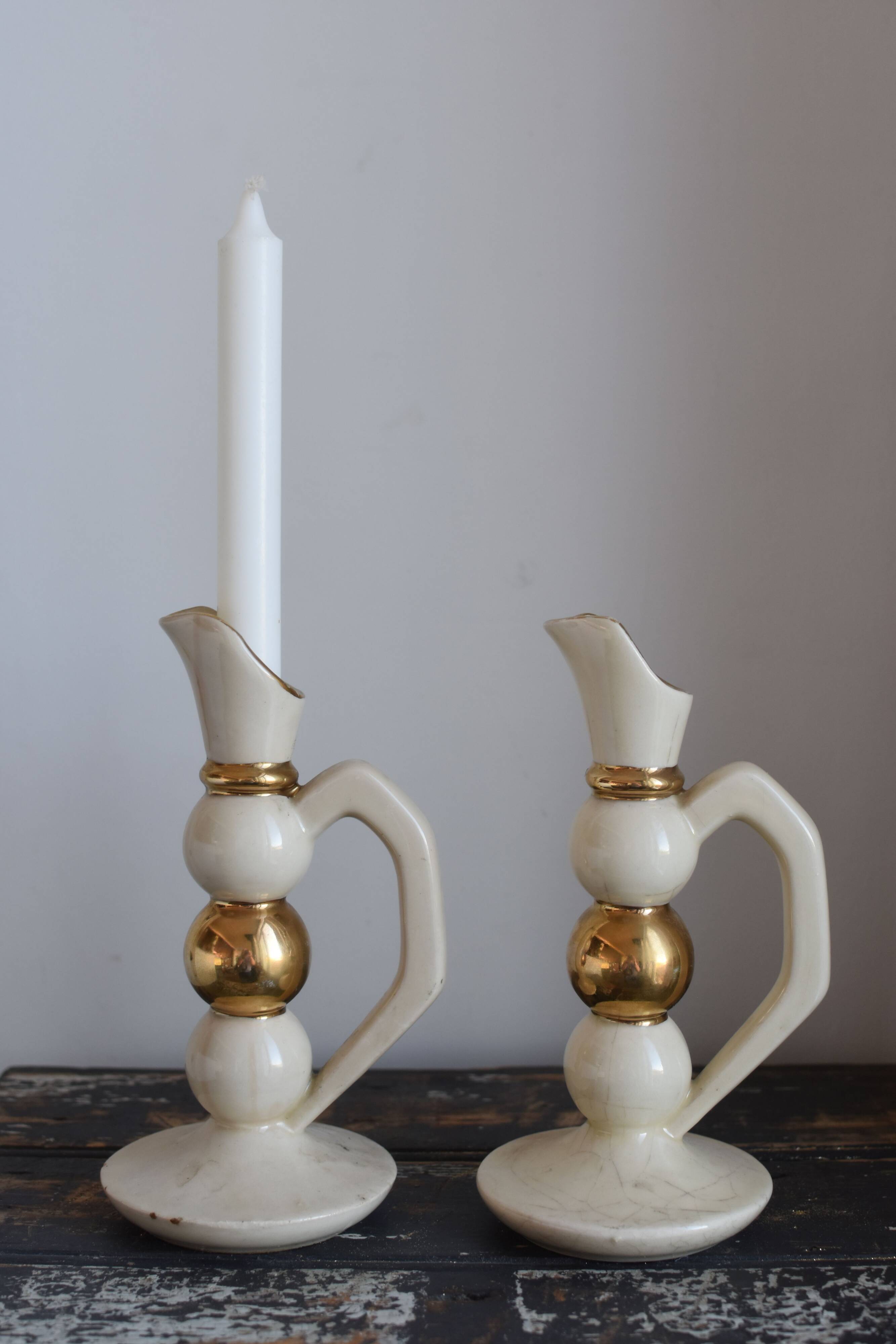 Pair of designer candle holders
