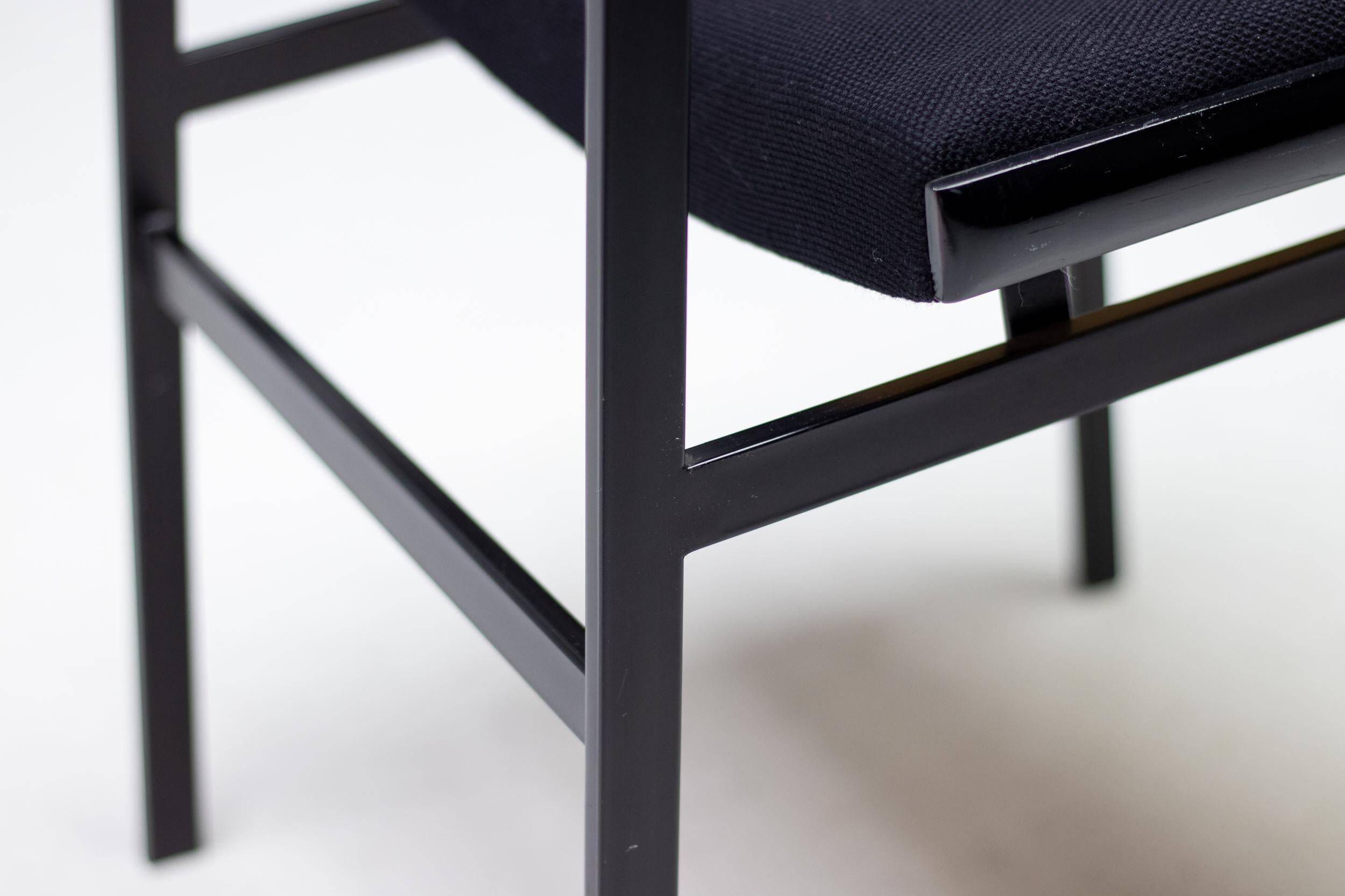 Set of four entirely black Hulmefa dining chairs, Architectural Modernism.