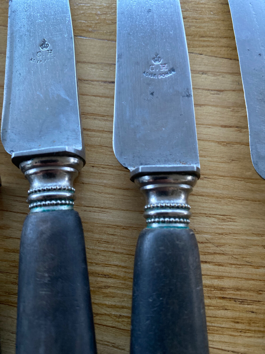 12 knives melted steel ebony handle