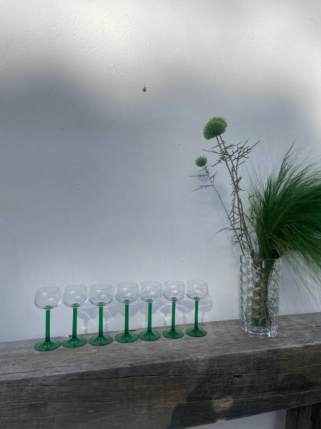 7 green glass stemmed glasses