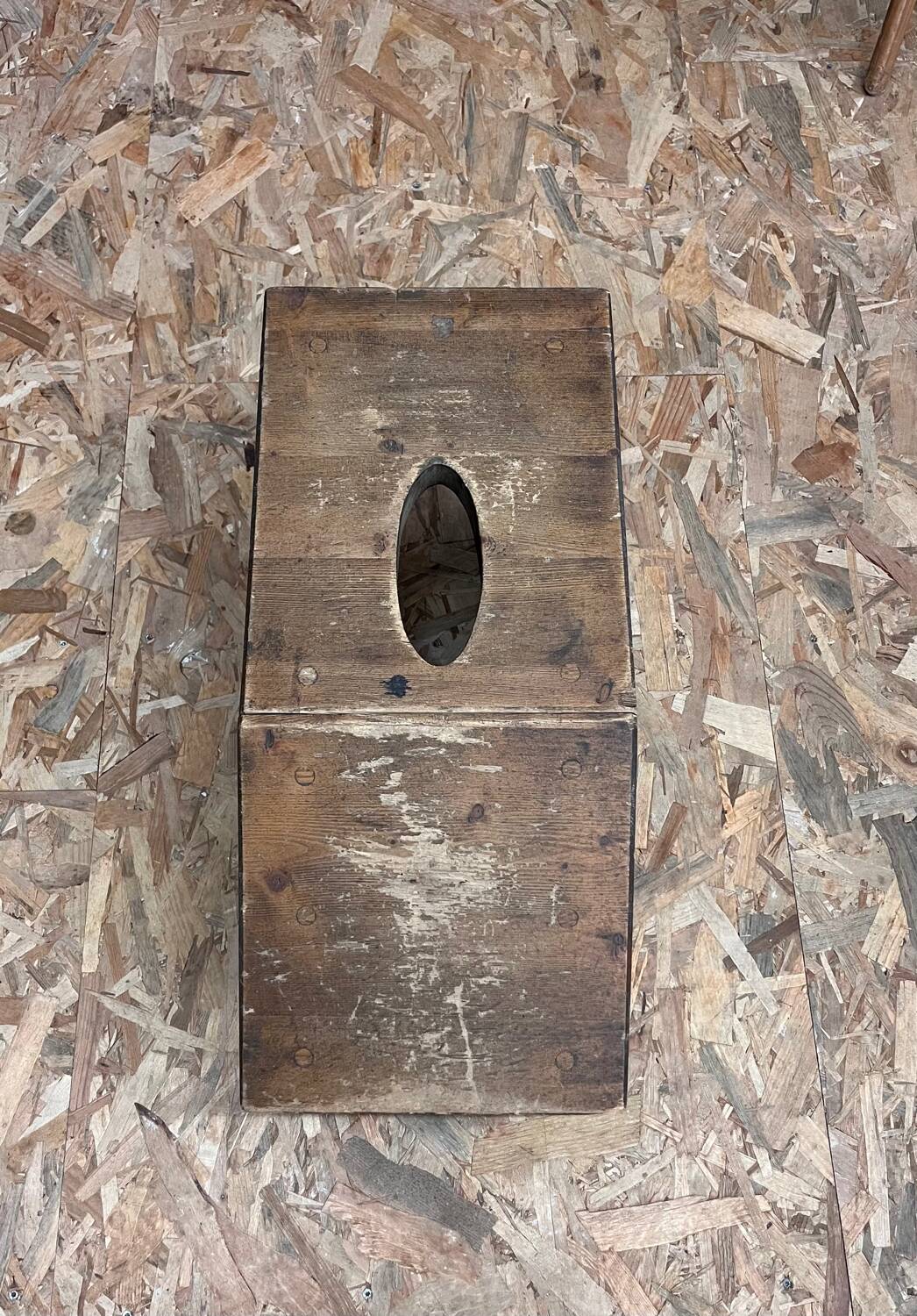 Old wooden footrest stool