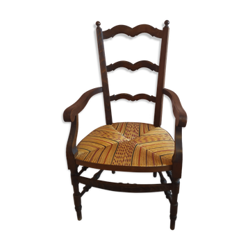 Wooden armchair with a straw seat