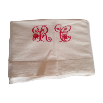 Linen drapery embroidered in red