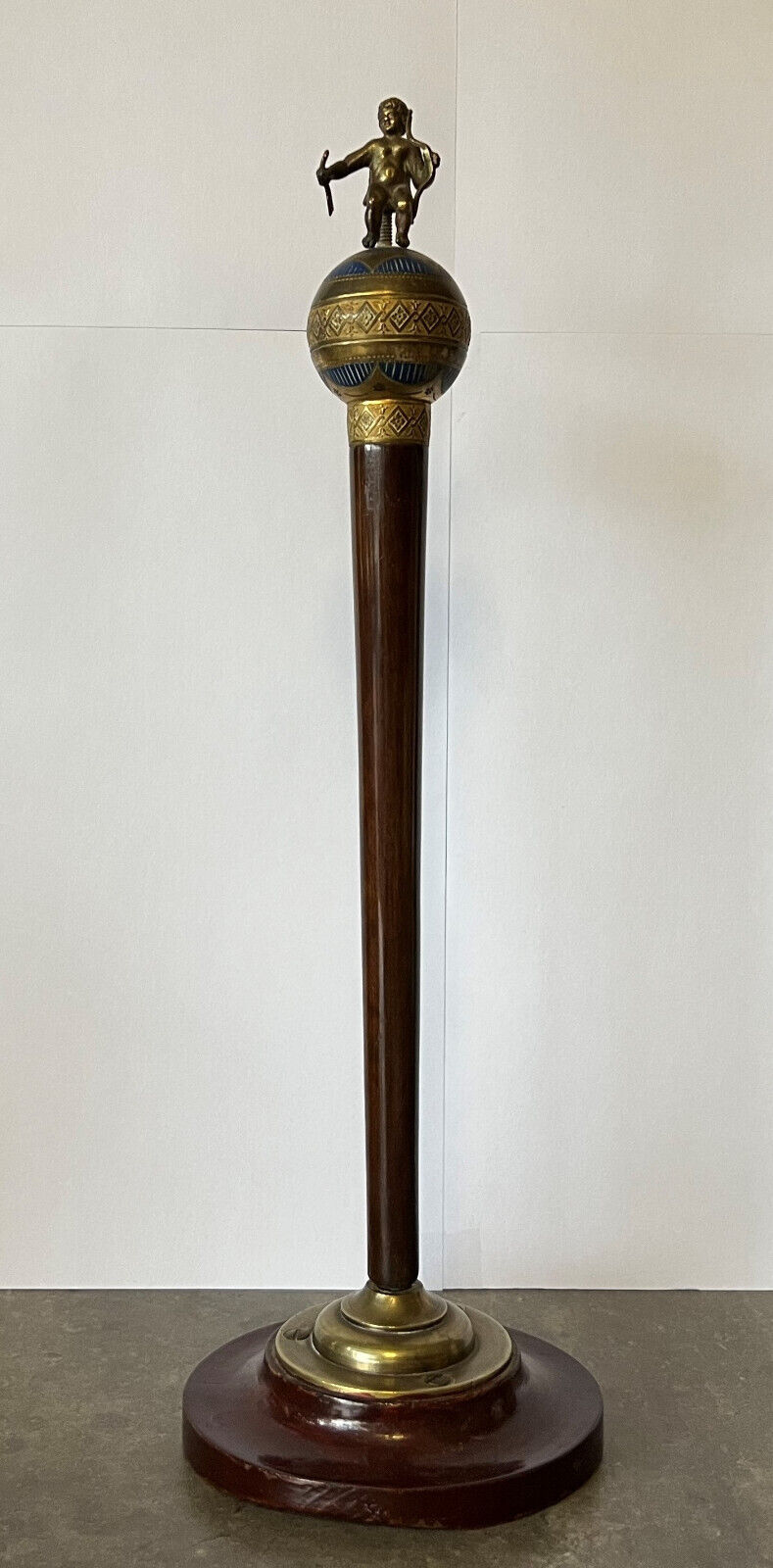 Precious cane tip in mahogany and gilded bronze with polychromy