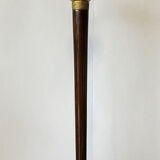 Precious cane tip in mahogany and gilded bronze with polychromy