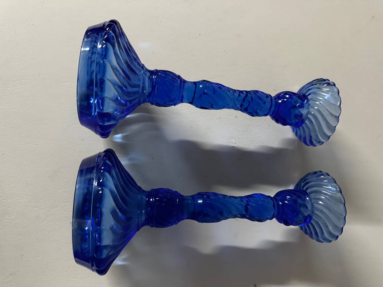 Pair of vintage cobalt blue twisted glass candlesticks h 24.5 cm