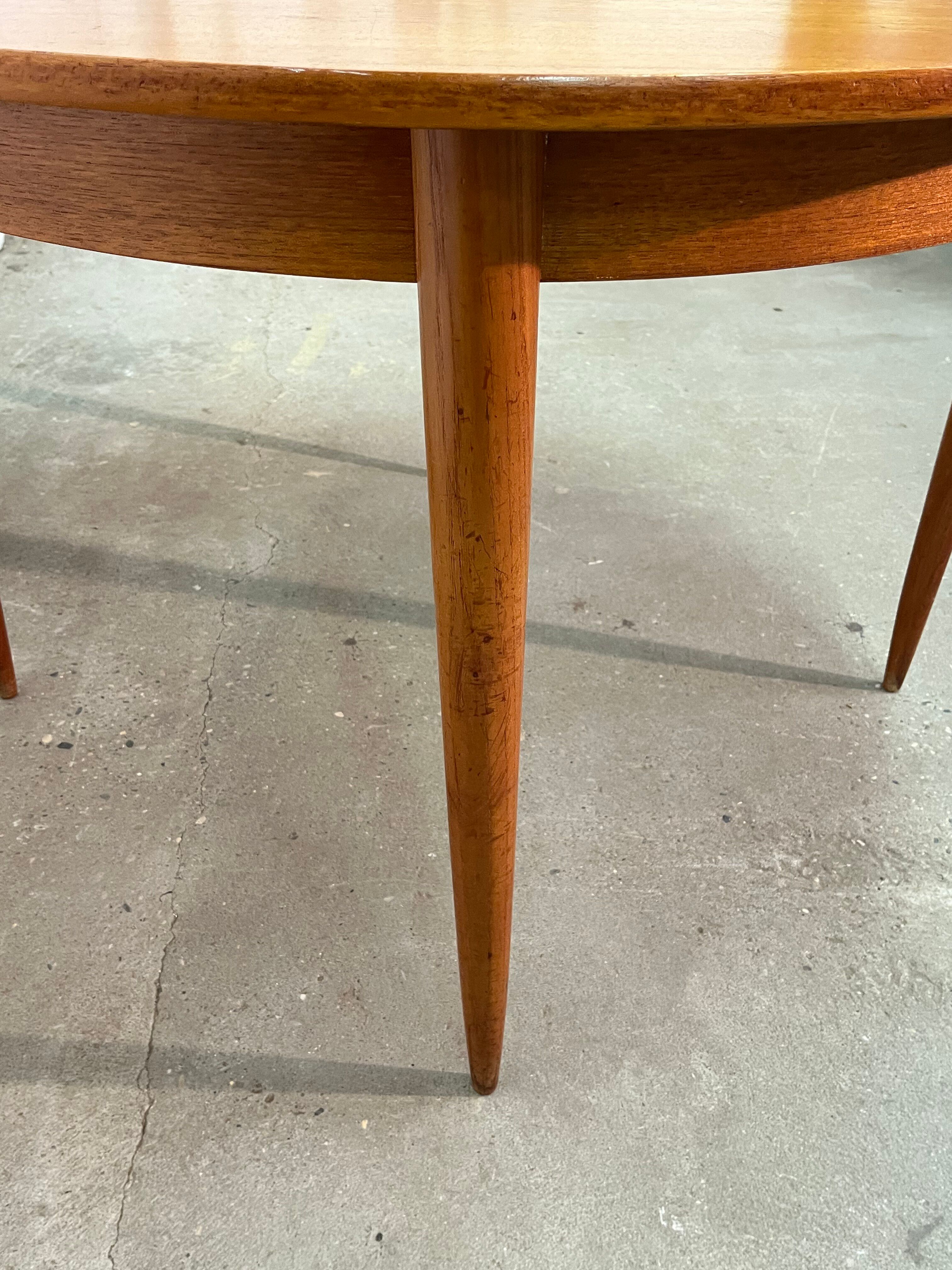 Vintage 1960s teak extendable Scandinavian table.