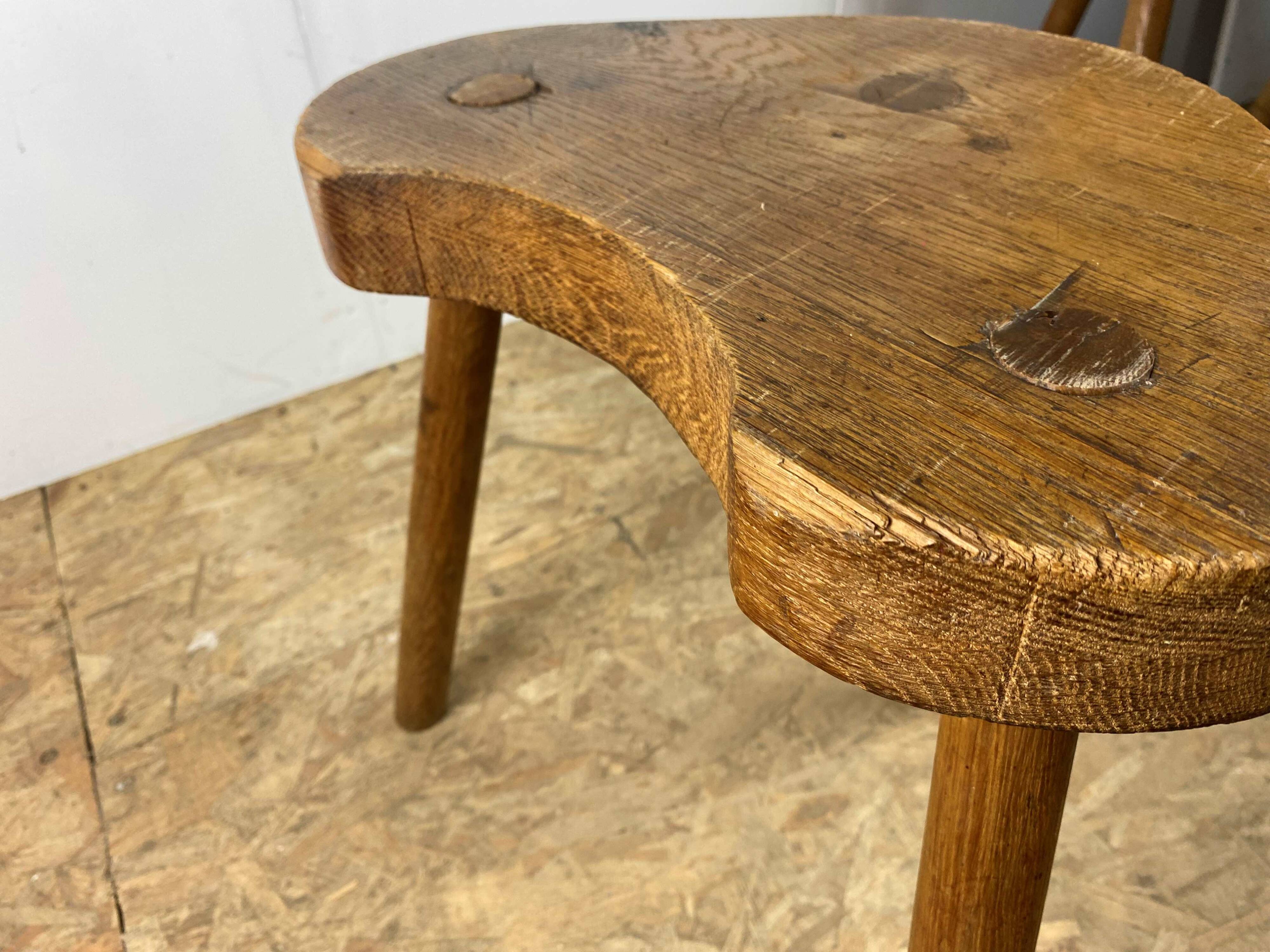Set of 6 brutalist solid oak tripod farm stools from the 1950s