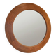 Round wall mirror made of solid wood