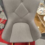 Rocking chair in gray fabric in new condition
