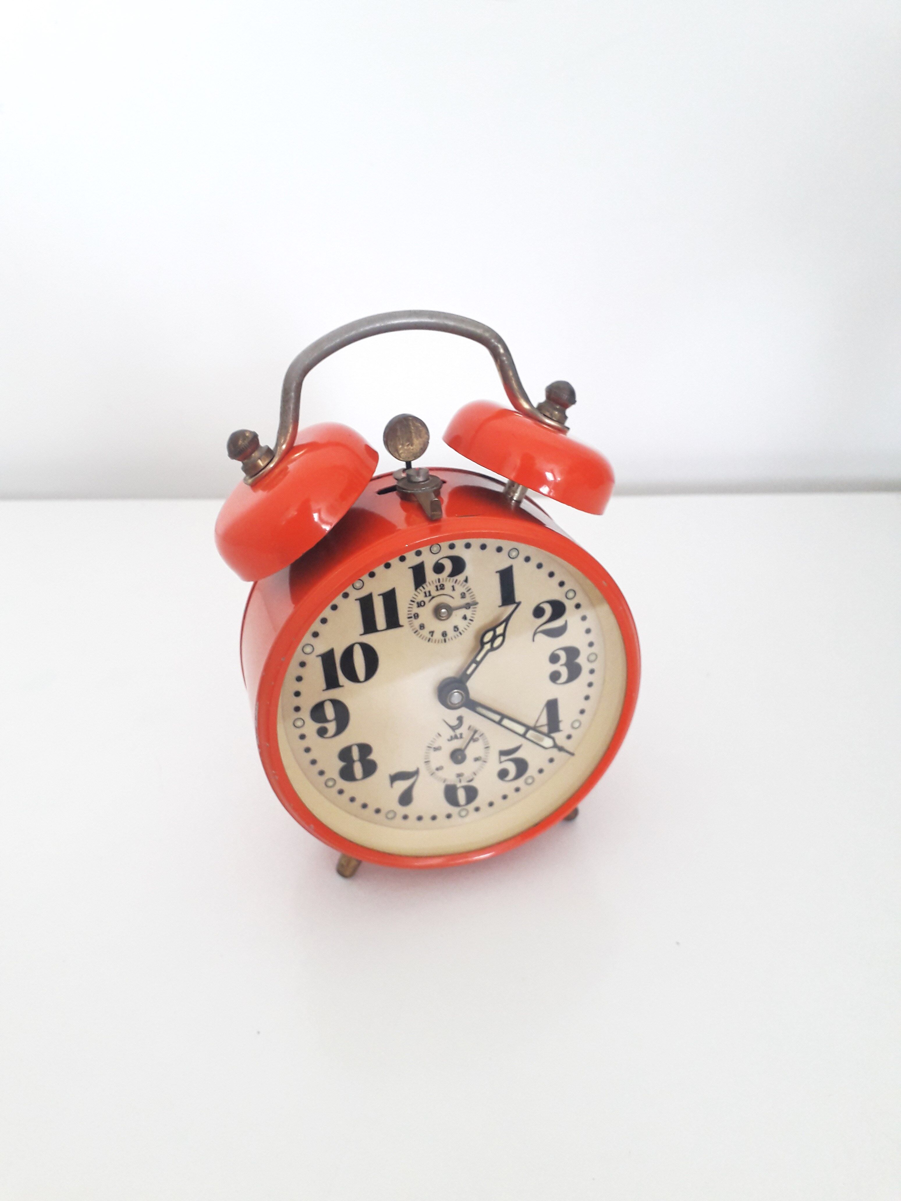 Old mechanical alarm clock JAZ CLIBIC - Orange lacquered metal - 1970