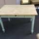 Dining table with painted legs