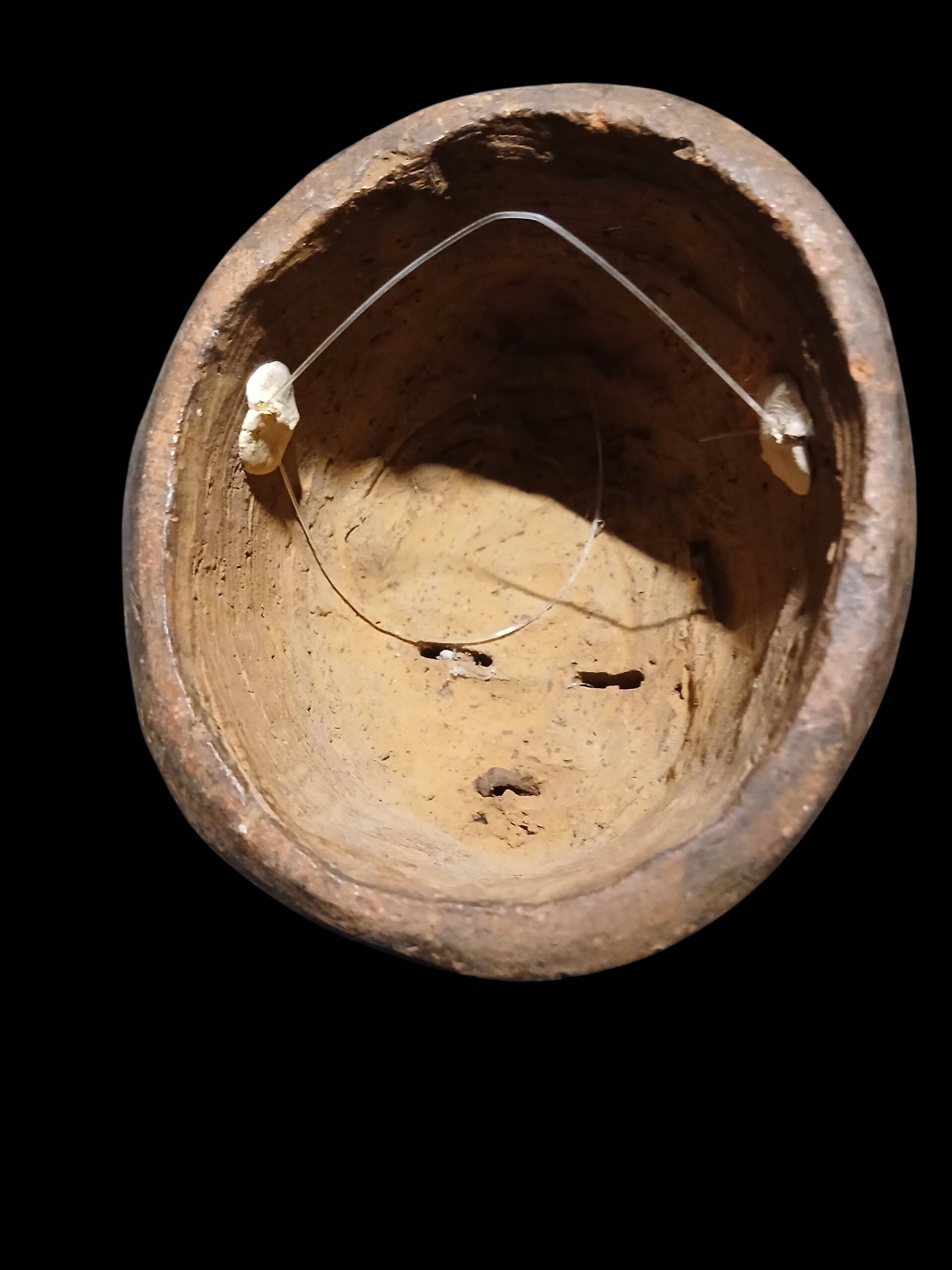 Terracotta mask from the Punu people of Gabon.