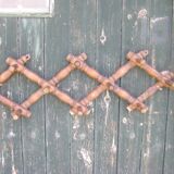 Old wall coat rack "accordion"