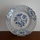 Old openwork Meissen earthenware plate decorated with blue onions 19th century