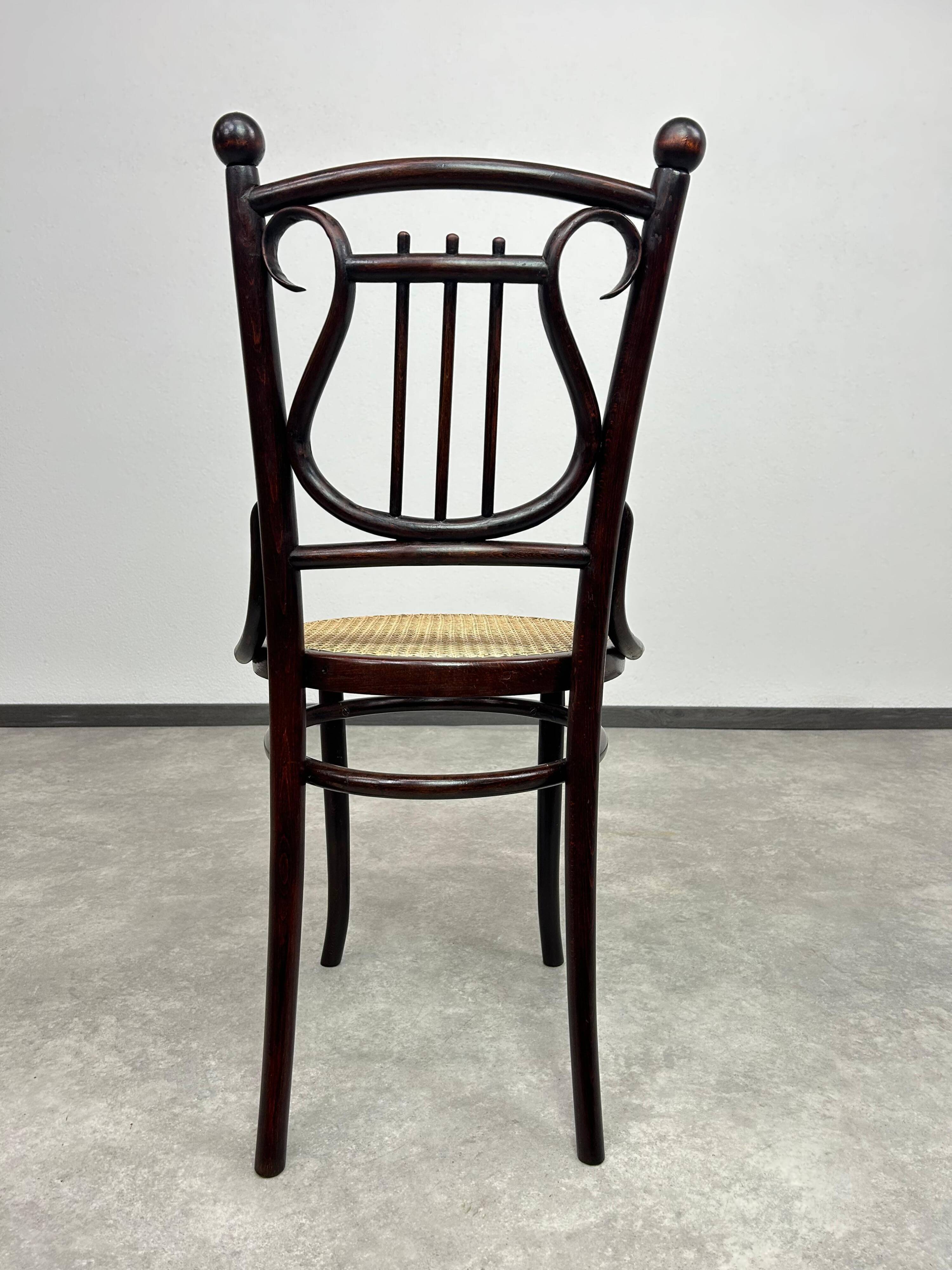 Curved wooden chair attributed to Thonet.