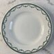 Set of 17 flat plates in Saint Amand earthenware, 22.5cm.