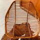 Rattan armchair and black metal base 1960