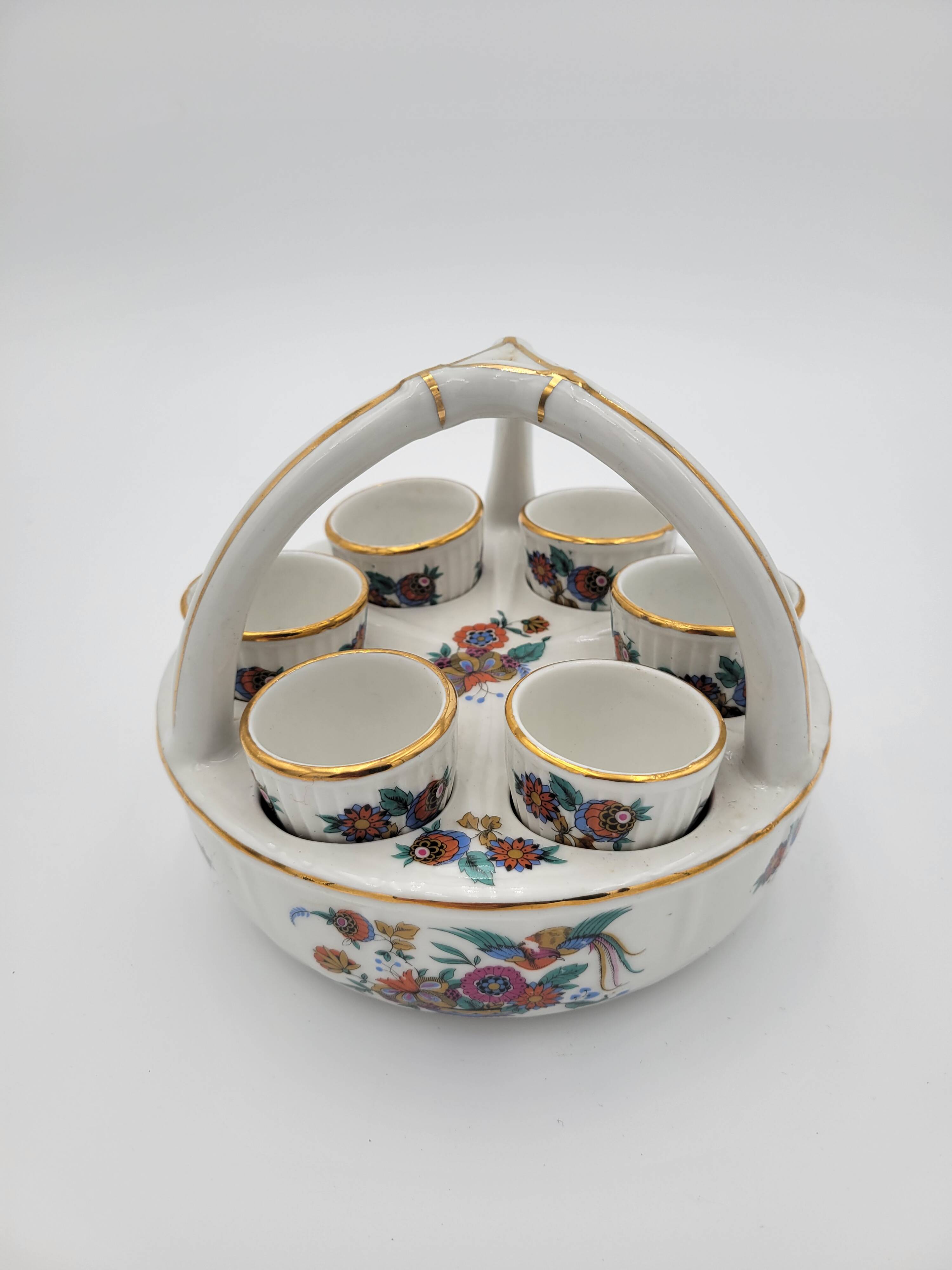 Porcelain egg dish basket with polychrome floral decoration