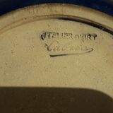 Signed stoneware pot cover
