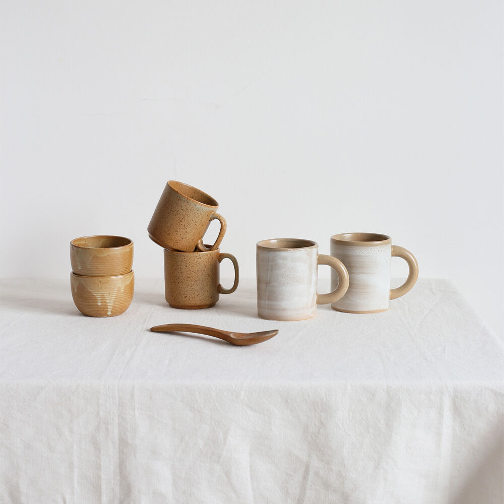 Pair of sandstone cups