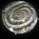 Table basse ronde à double plateau de verre, décor sculpté en spirale