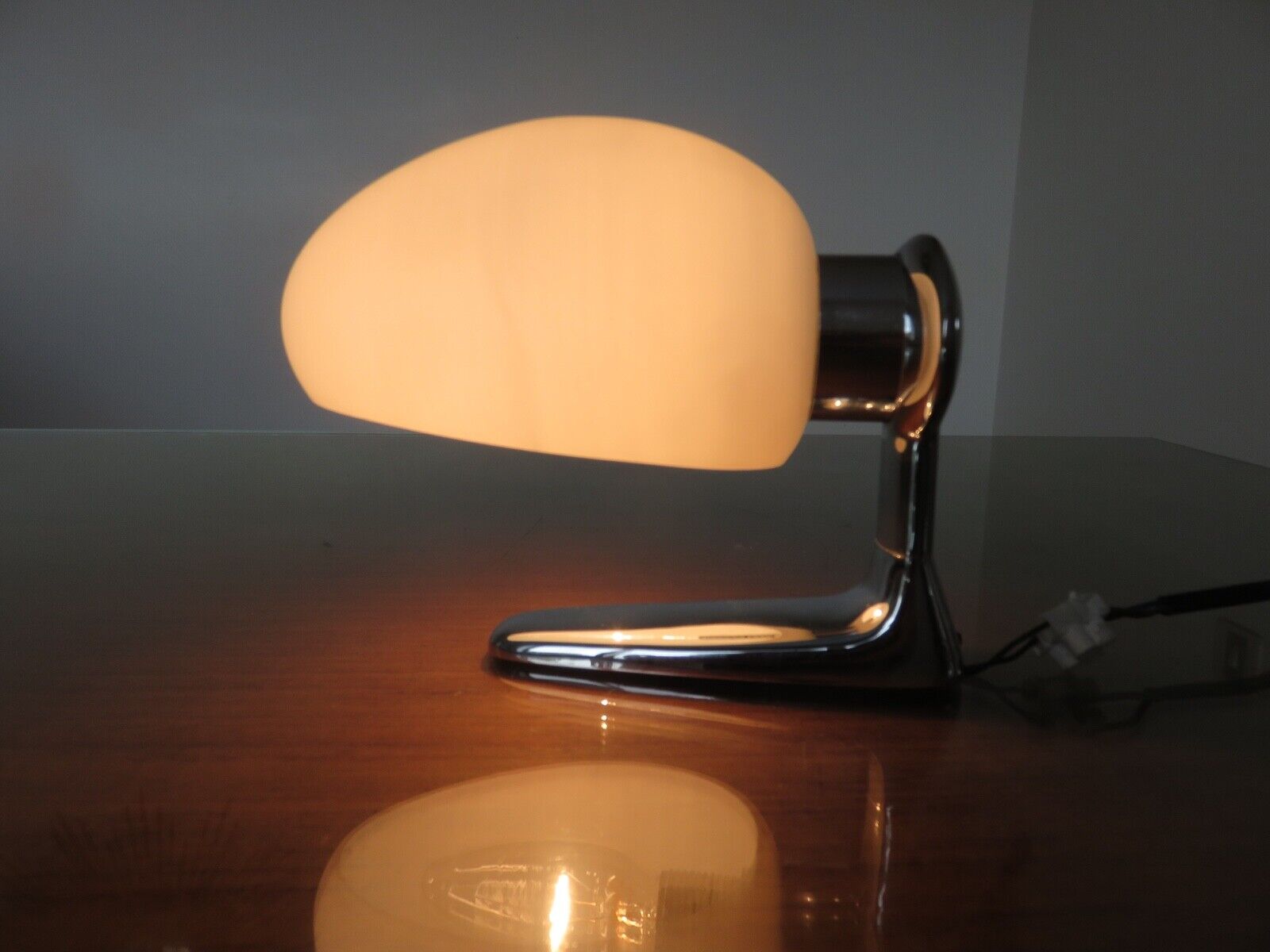 Wall lamps in chromed metal and opaline glass