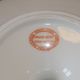 Set of 4 porcelain display cups of the depot rue Drouot in Paris