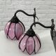 pair of iron wall lights and Tiffany style glass legs