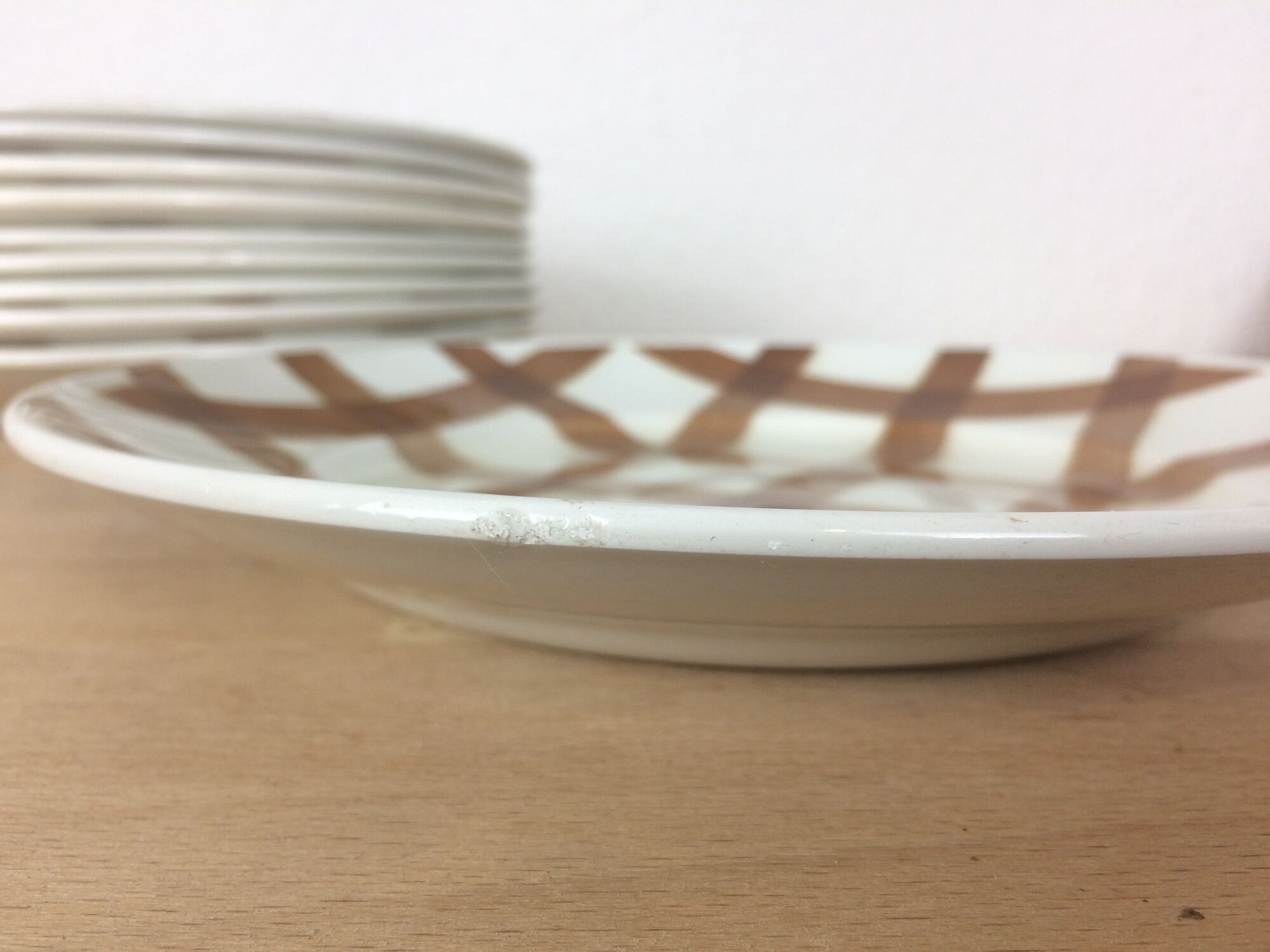 10 ceramic "nappe" plates from the Moulin des Loups, brown