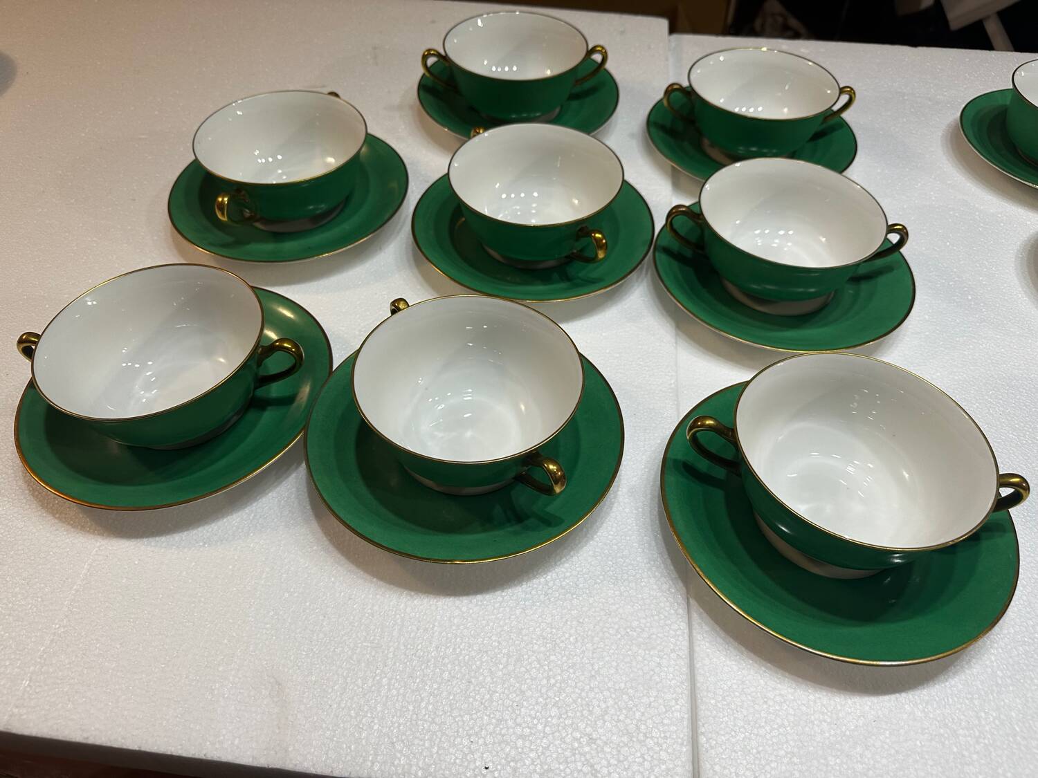 Service 14 cup and saucer in Art Deco Emerald Green and Gold.