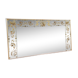 Glass mirror with a decoration engraved with golden foliage 1960