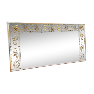 Glass mirror with a decoration engraved with golden foliage 1960
