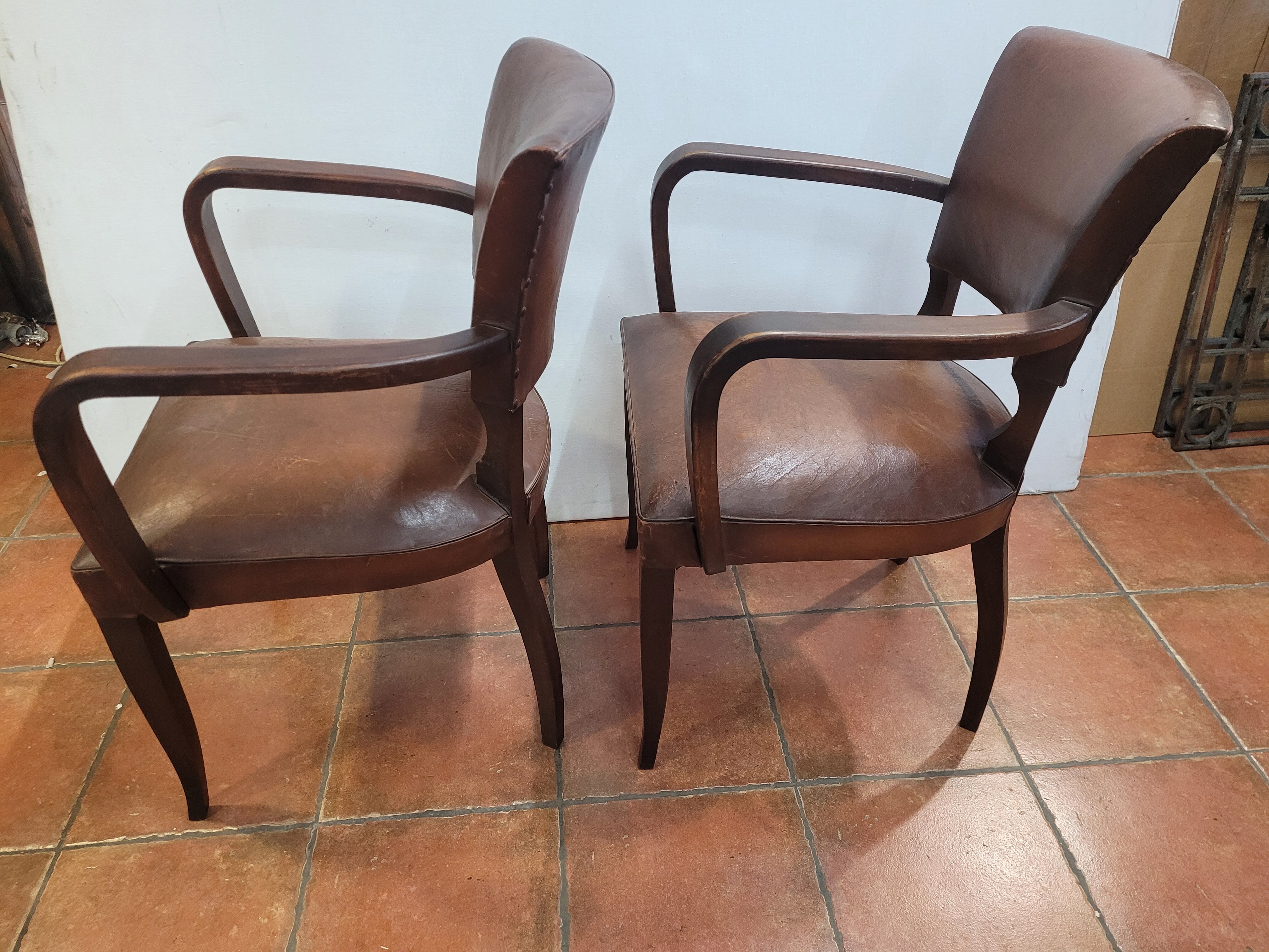 Paire de fauteuils bridge ancien en cuir