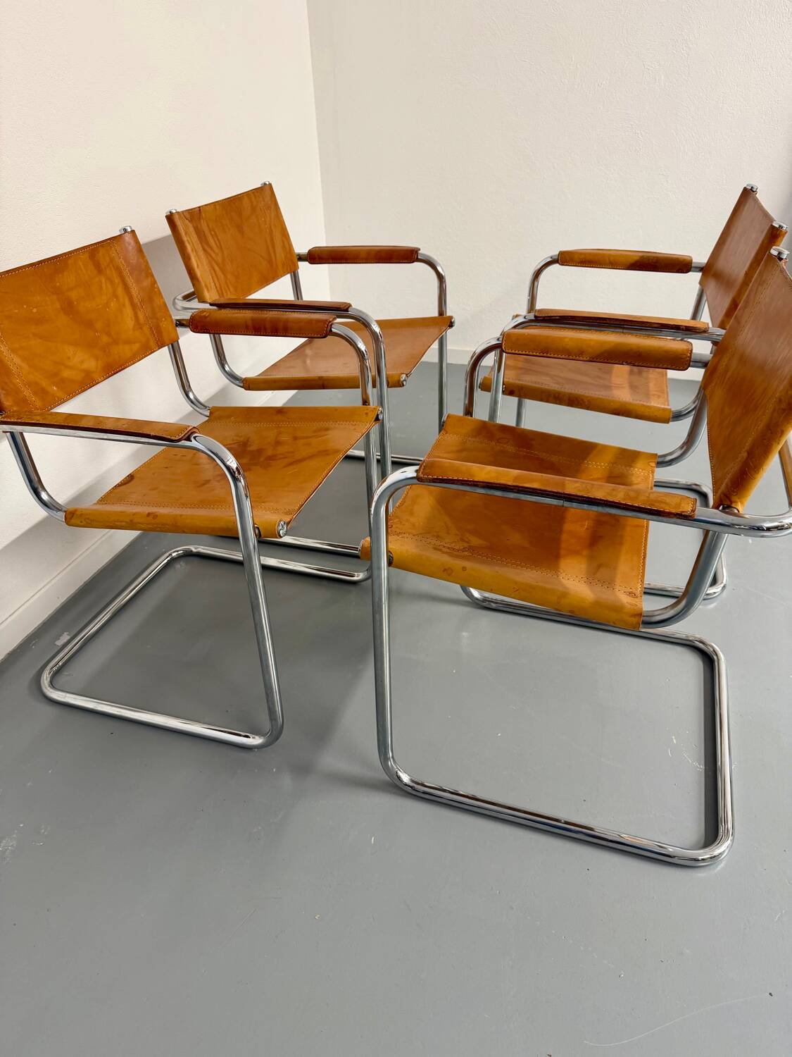 4 vintage tubular chairs with patinated leather designed by Mart Stam
