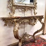 Important console table with a curved shape + Louis XV style mirror in gilded and silvered wood.