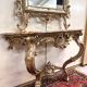 Important console table with a curved shape + Louis XV style mirror in gilded and silvered wood.