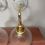 Pair of chiseled glass wall sconces