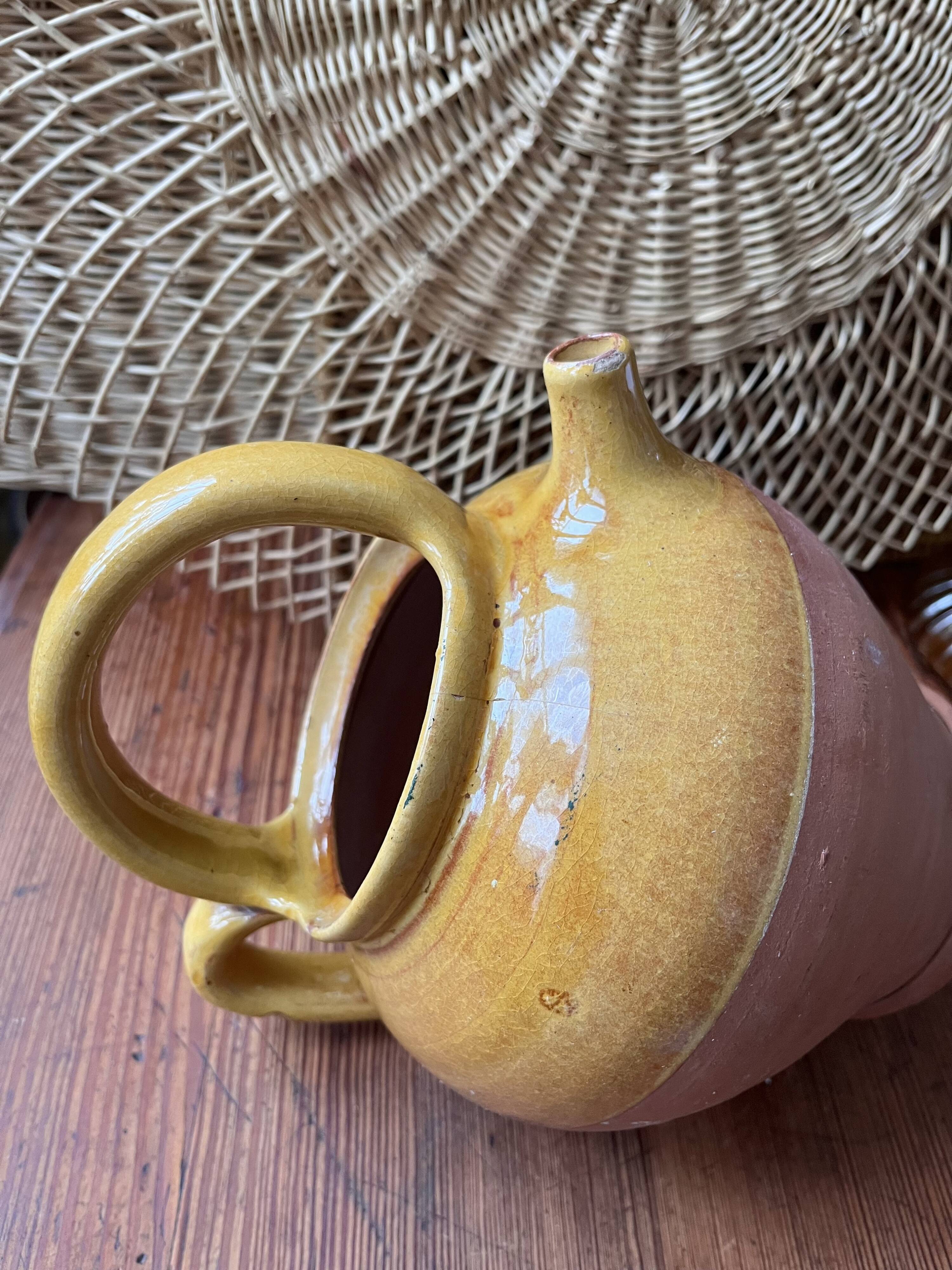 Provençal terracotta pitcher/jug with yellow glaze