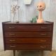 Chest of drawers with tapered feet