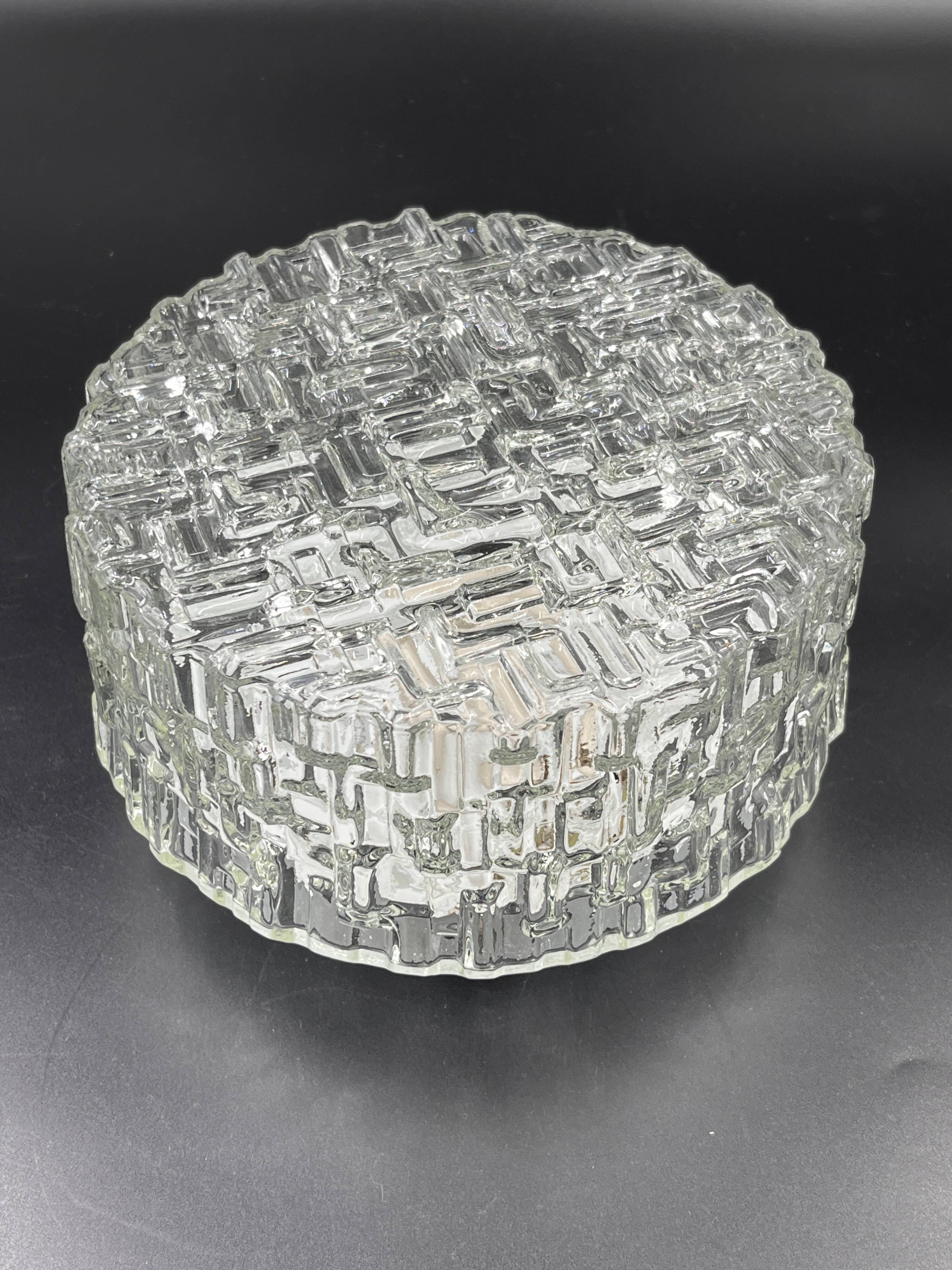 Molded glass ceiling light with relief